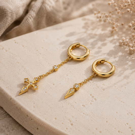 Goldene Lichtkreuz Ohrringe aus 925 Sterling Silber mit Zirkonia auf hellem Stein